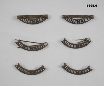 Six Australia Uniform Badges.