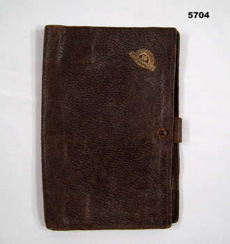 Brown leather document folder.