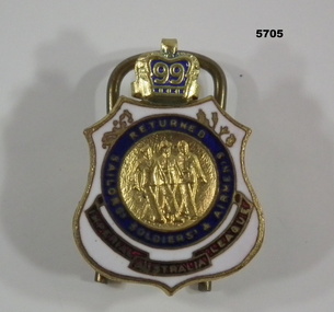 Shield shaped metal and enamel R.S.S.A.I.L.A. lapel badge.