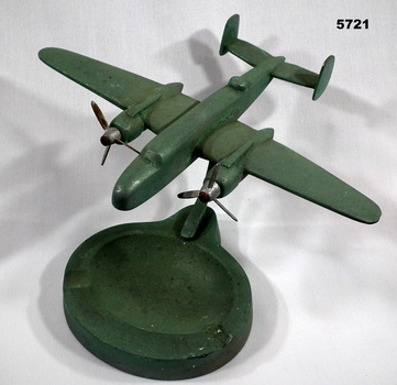 Ashtray with model plane.