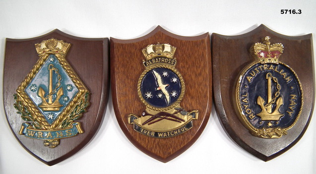 Three timber Navy plaques.