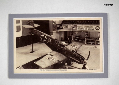 Black and white postcard style photograph of a WW2 German aircraft. 