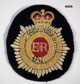Unit badge material with embroidery.