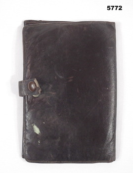 Brown colour leather folding wallet.