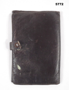 Brown colour leather folding wallet.