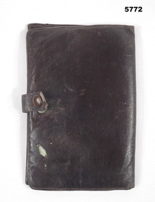 Brown colour leather folding wallet.