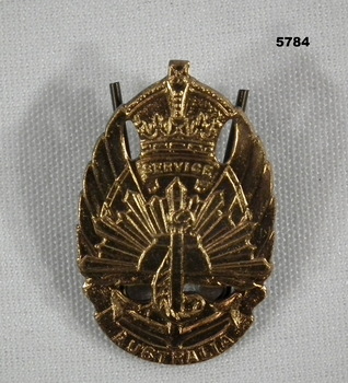 Gold colour Service Australia badge WW2