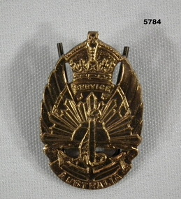 Gold colour Service Australia badge WW2