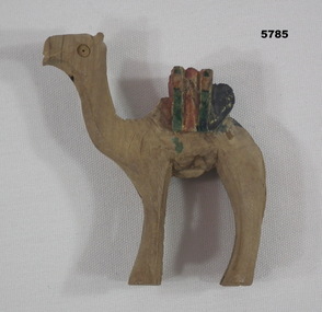 Small wooden camel souvenir from the Middle East.
