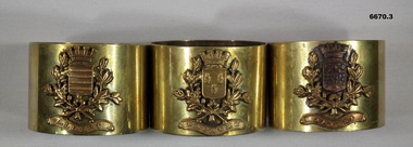 Three Souvenir Gold Napkin Rings.