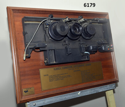 Lenses from the Klimsch Commodore Camera mounted on a display board