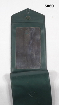 Shaving mirror in a Nylon case.