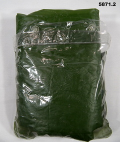Green Nylon poncho with hood.