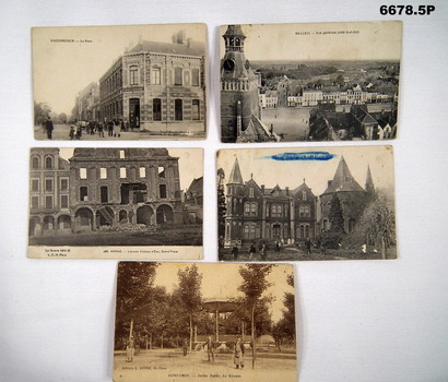 Four black & white postcards and one sepia postcard WW1.