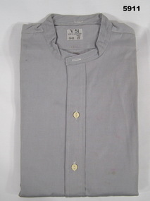 Grey collarless RAAF uniform shirt with half closure two button front.