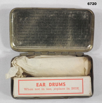 Open tin - ear plugs and antiseptic ointment.