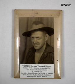 Black and white, head and shoulders portrait of a soldier.