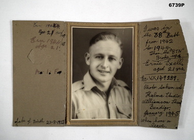 Sepia photograph on cardboard backing - head and shoulders pose.