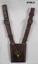 Ceremonial brown leather scabbard with metal studs.