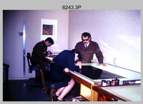 Technicians retouching Orthophotomap reproduction material at the Army Survey Regiment. c1975.