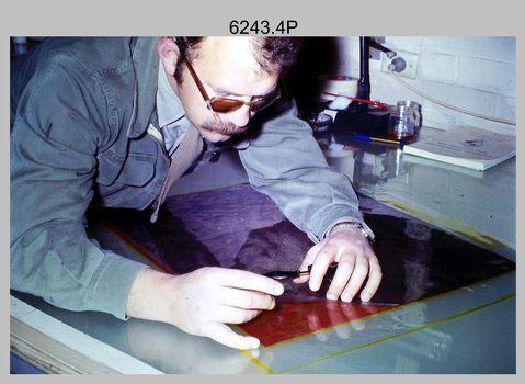Technicians retouching Orthophotomap reproduction material at the Army Survey Regiment. c1975.