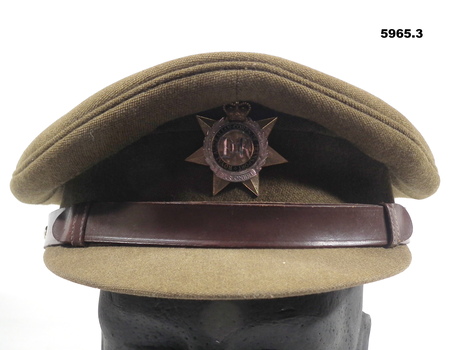 Khaki battle dress jacket, cap and trousers with RACT badges.