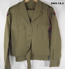 Khaki battle dress jacket, cap and trousers with RACT badges.