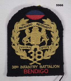 Cloth badge representing the 38th Battalion.