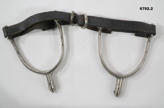 Set of horse spurs with leathers strap.