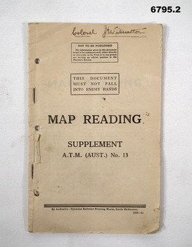 Three training manuals on maps and reading.