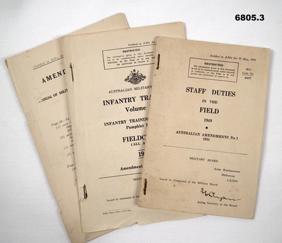 Three booklets, Staff Duties, Military Law and Infantry Training.