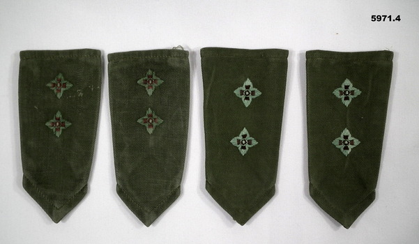 Two Pairs of jungle green coloured slide shoulder boards with Lieutenant's pips.