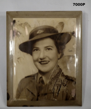 Framed photo of AWAS female in uniform.