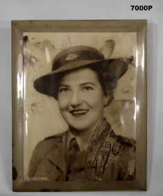 Framed photo of AWAS female in uniform.