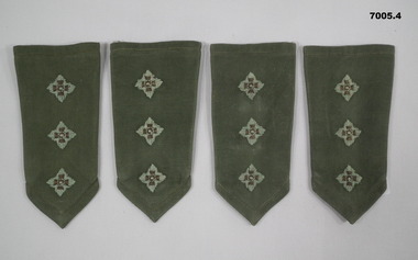 Two pairs jungle green coloured slide shoulder boards with Captain's pips.