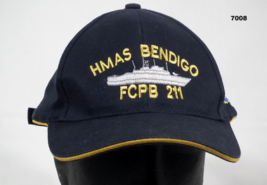 Ball cap issued to the decommissioning crew of HMAS Bendigo.