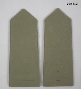 Pair khaki coloured shoulder boards without rank insignia or corps badge.