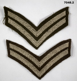 Pair of Corporal stripes for a tunic or great coat.