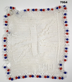 Embroidered “Union Jack” Doiley.