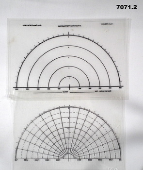 Two Artillery range protractors.