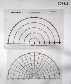 Two Artillery range protractors.