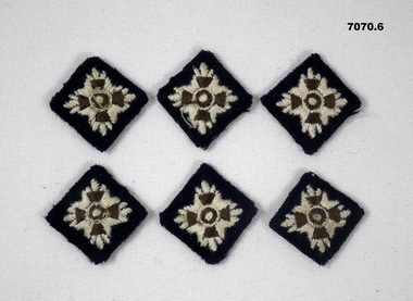 Collection of six army officer's cloth pips.