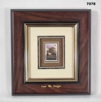 Commemorative stamp framed, Lest we Forget.