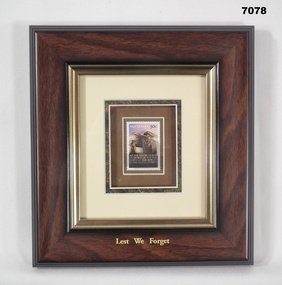 Commemorative stamp framed, Lest we Forget.
