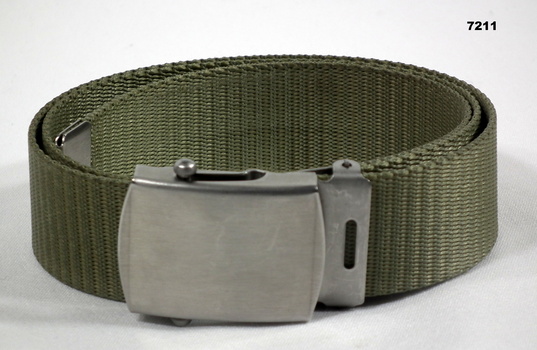 Green coloured belt for wearing with polyester uniform.