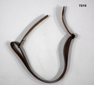 Brown leather chin strap for a slouch hat.