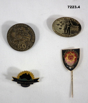 Four badges to commemorate Anniversary of Bombing of Darwin.