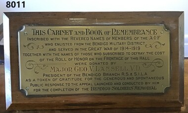 Plaque on the Book of Remembrance cabinet.
