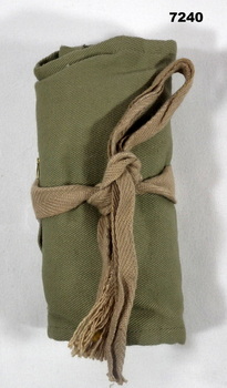 Army issue khaki personal sewing kit.