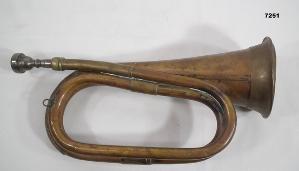Bugle with detachable mouthpiece.